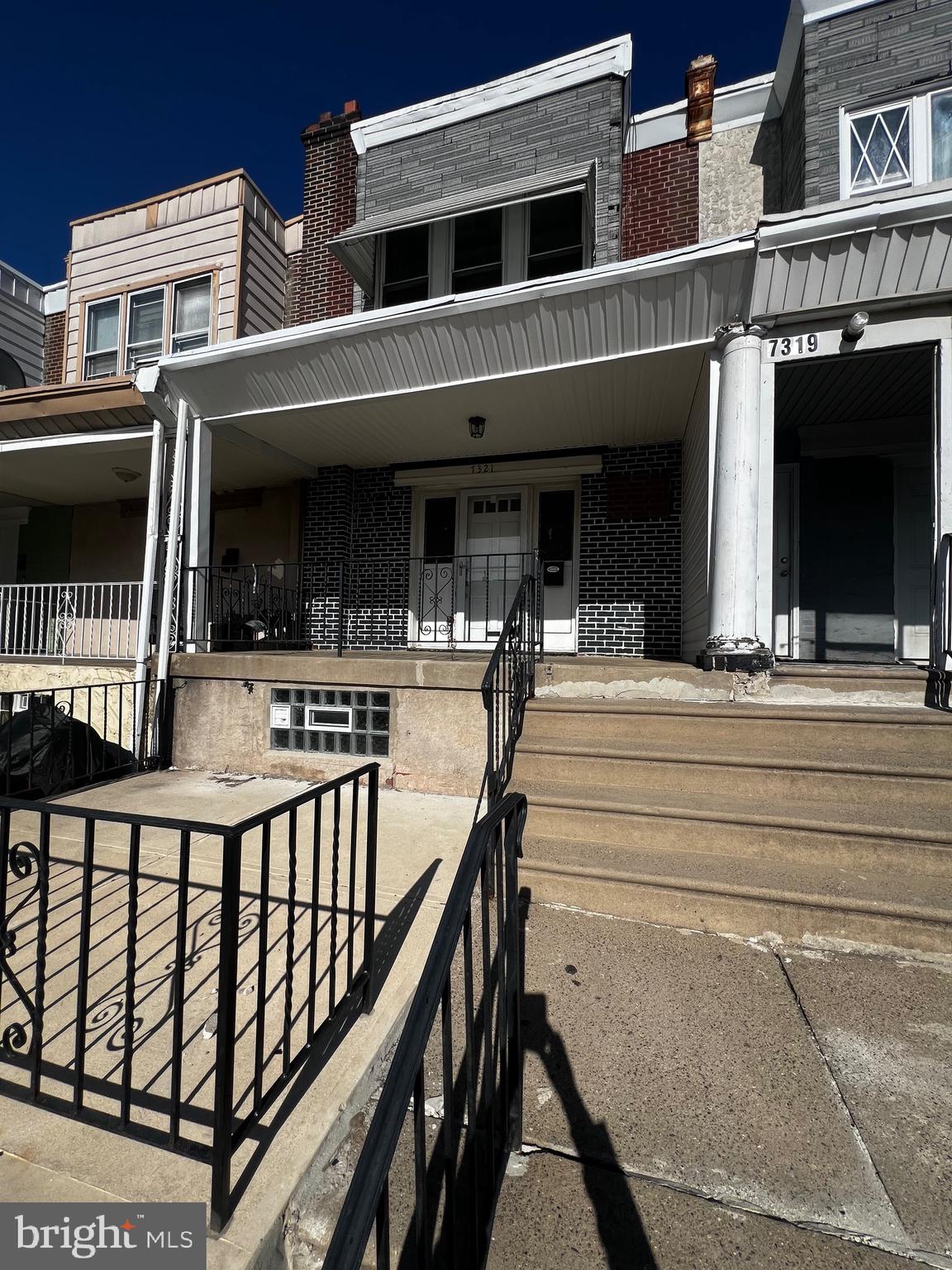 7321 Garman Street Philadelphia, PA 19153 - Photo 2 of 18 a view of a building and car parked