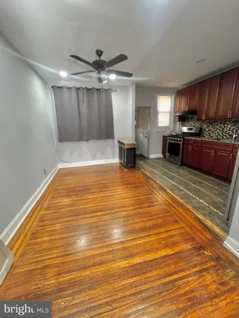 a view of a kitchen with a sink