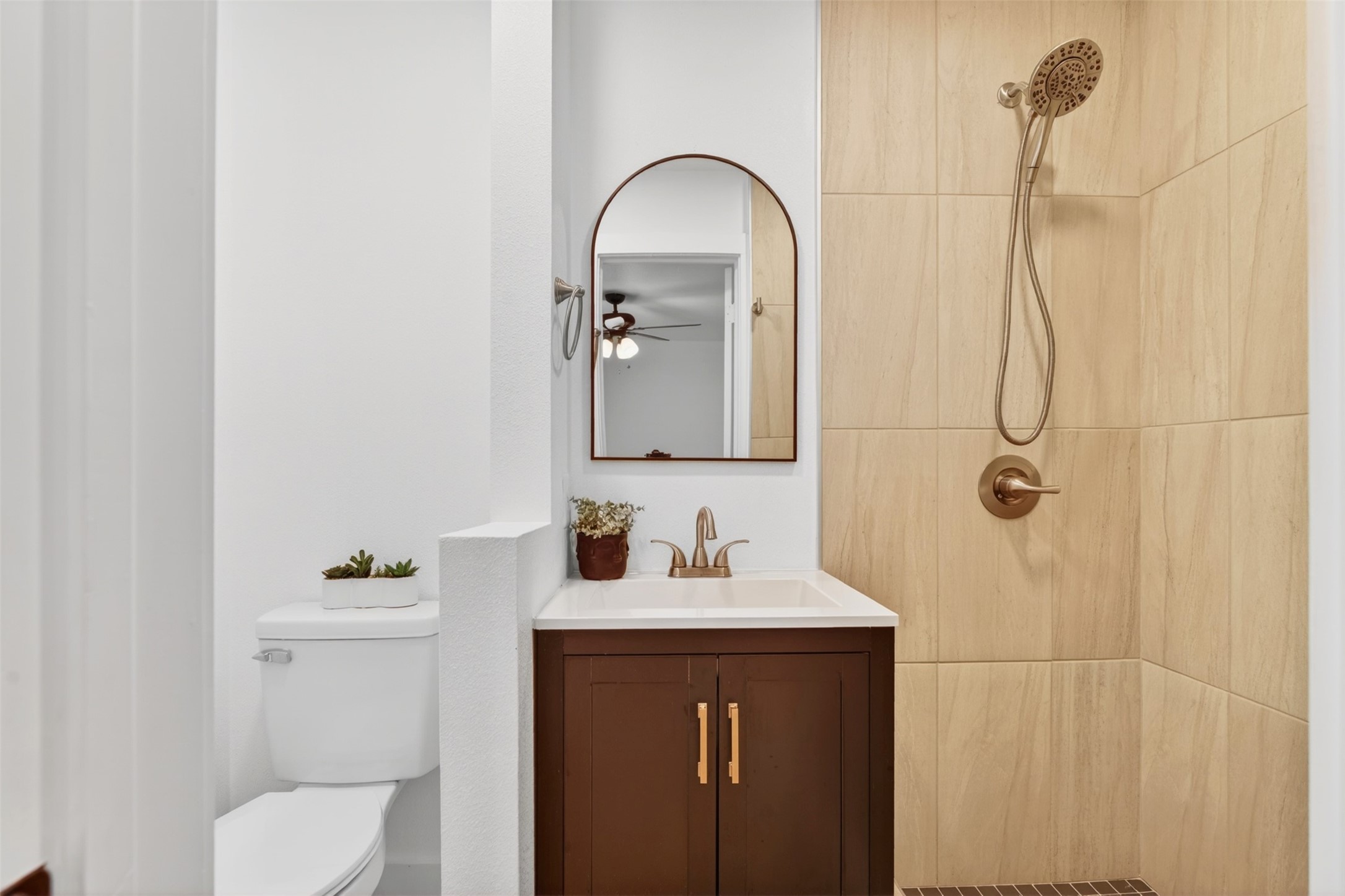 2716 Bagby Street Houston, TX 77006 - Photo 25 of 29 a bathroom with a sink a toilet and shower