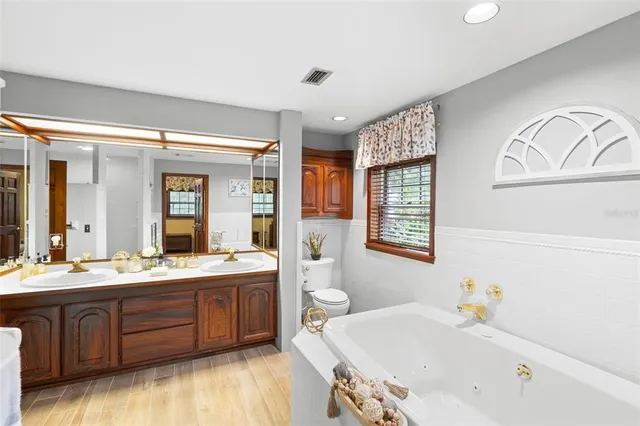 a view of a swimming pool with a yard