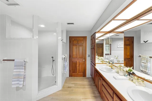 a view of a house with backyard porch and sitting area