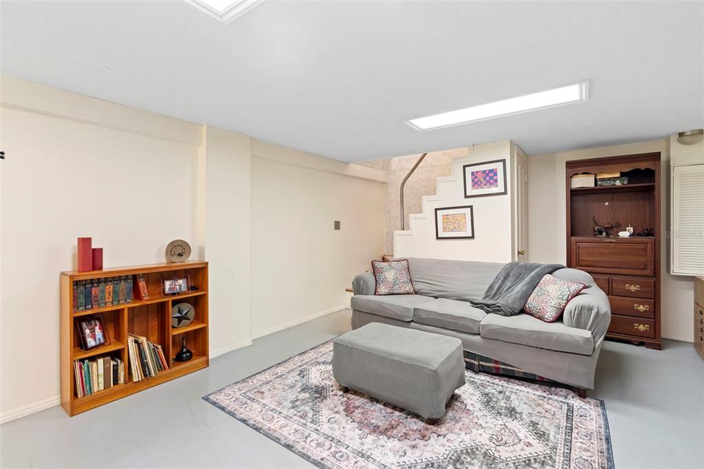 1056 Reynolds Road De Leon Springs, FL 32130 - Photo 38 of 74 a living room with furniture and baby crib