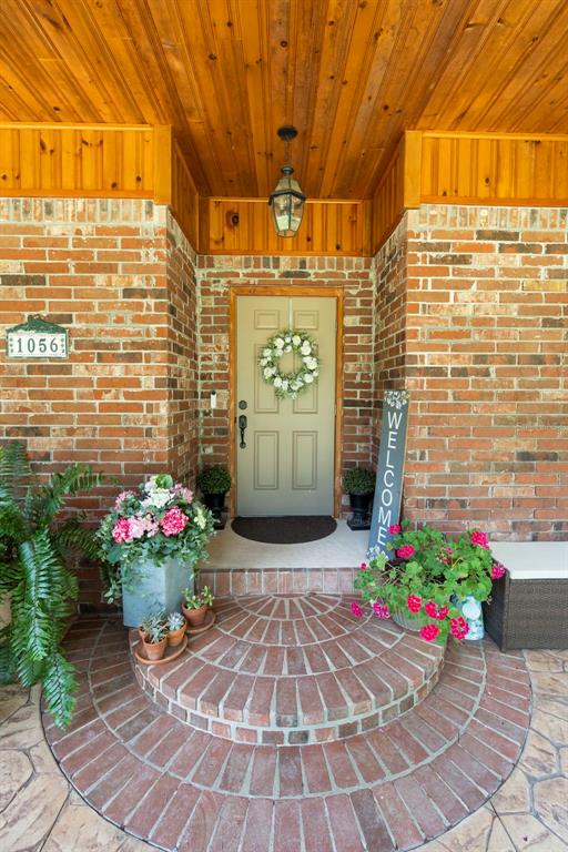 1056 Reynolds Road De Leon Springs, FL 32130 - Photo 9 of 74 a front view of a house with an outdoor space