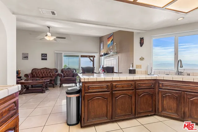a view of balcony with wooden floor