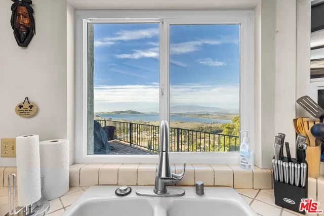 a balcony with wooden floor