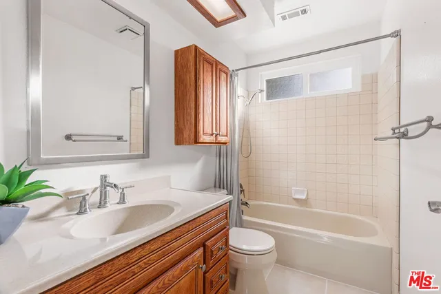 a view of balcony with wooden floor