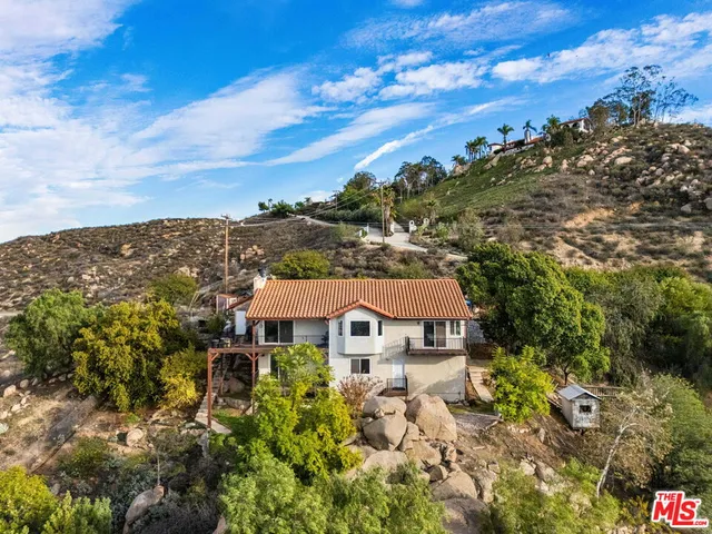a house view with a outdoor space