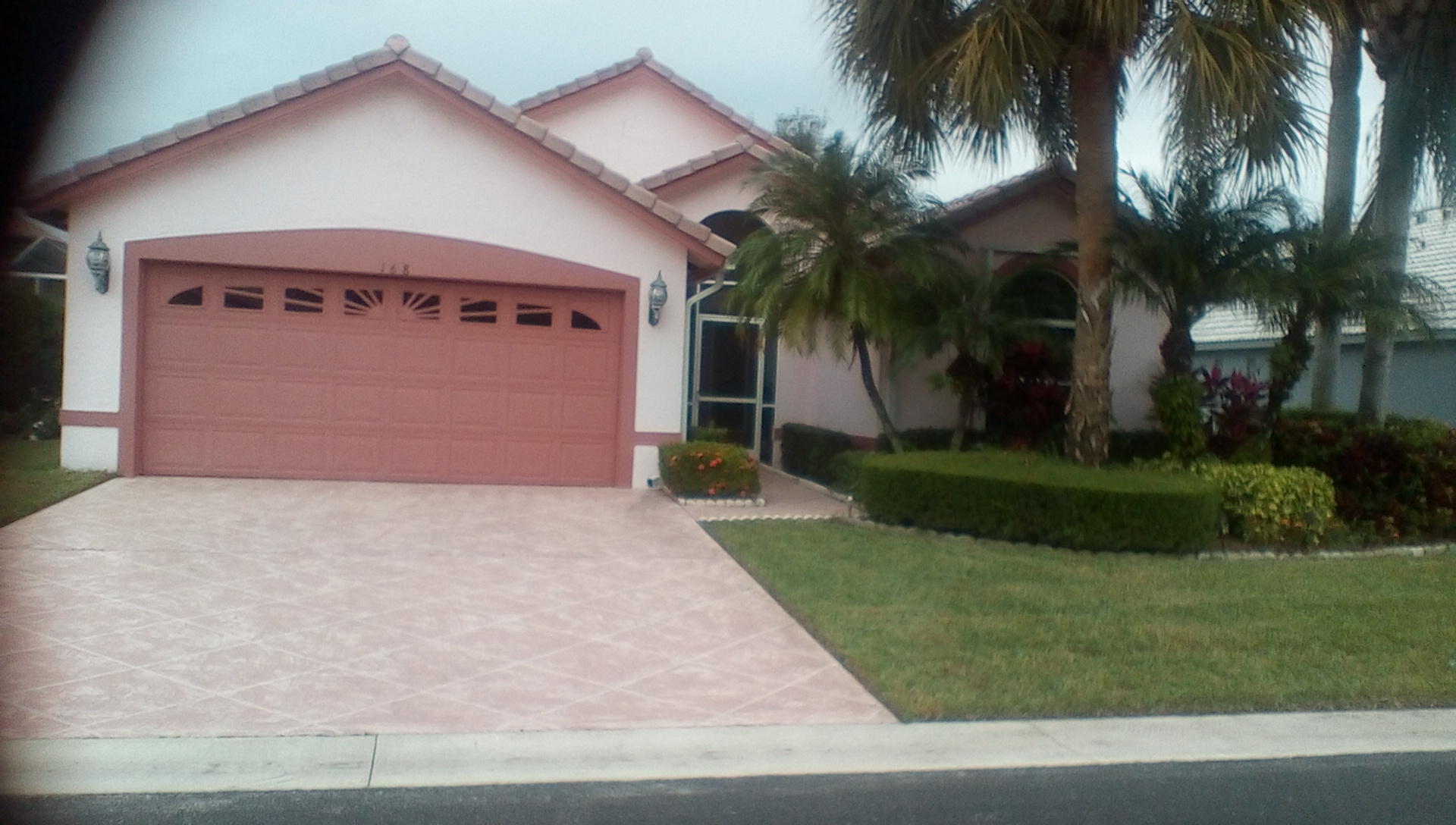 168 Cove Road Greenacres, FL 33413 - Photo 1 of 29 FRONT