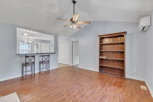 a kitchen with a sink stove and refrigerator