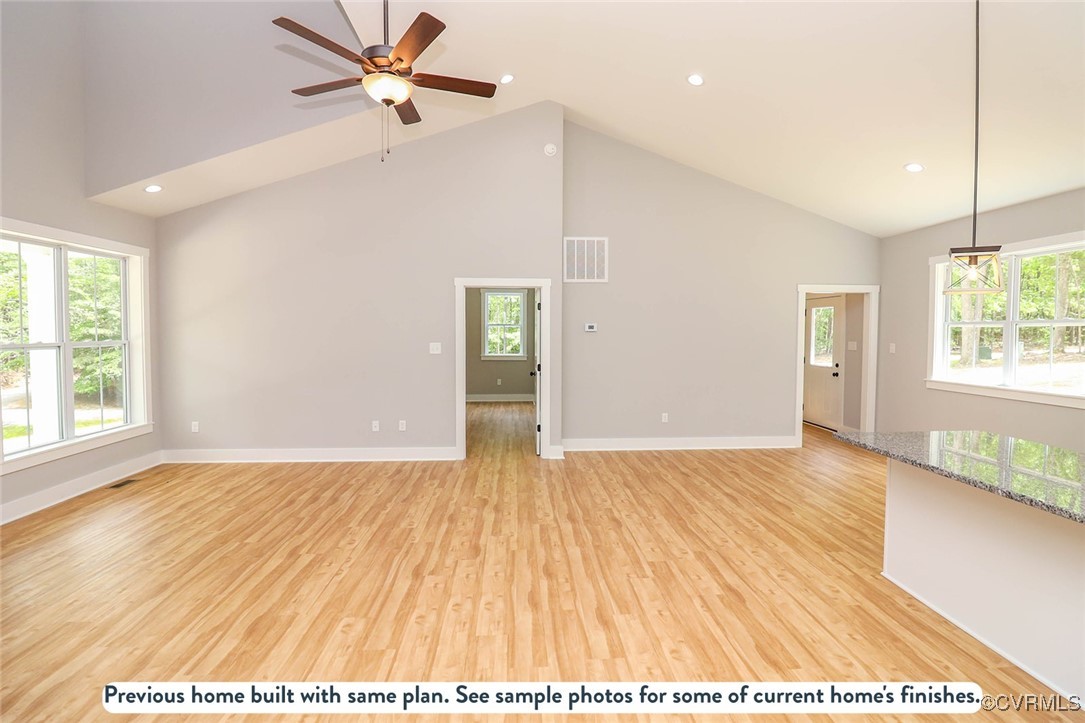 1676 Patterson Road Buckingham, VA 23921 - Photo 14 of 24 wooden floor in an empty room with a window