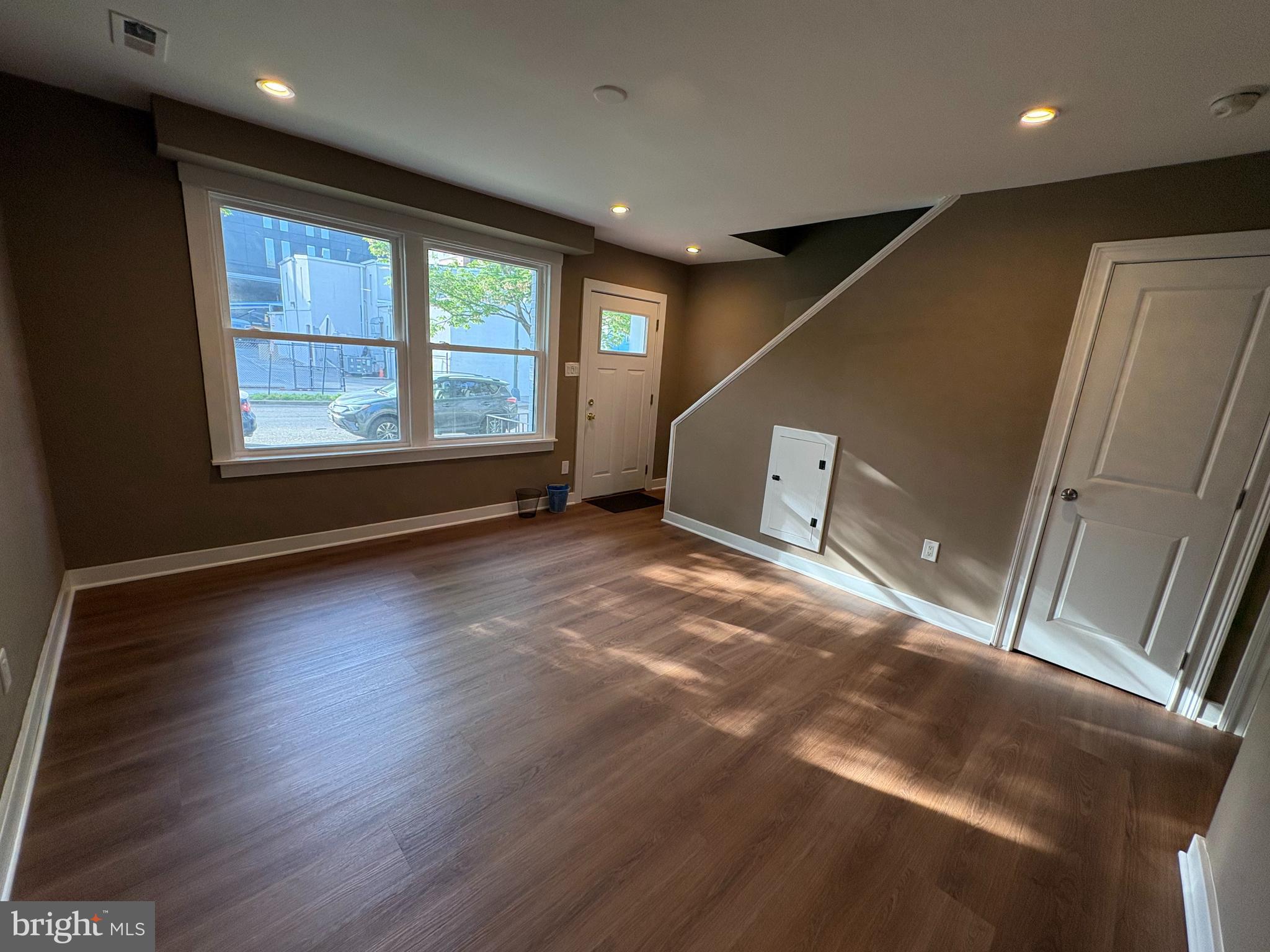 1206 16th Street Northeast Washington, DC 20002 - Photo 4 of 15 a view of livingroom with hardwood floor and window