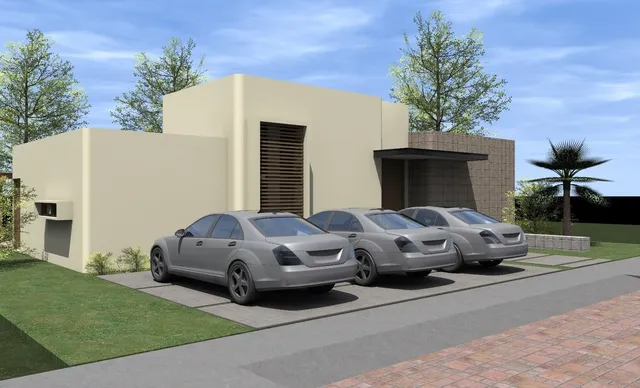 a front view of a house with a garden and parking