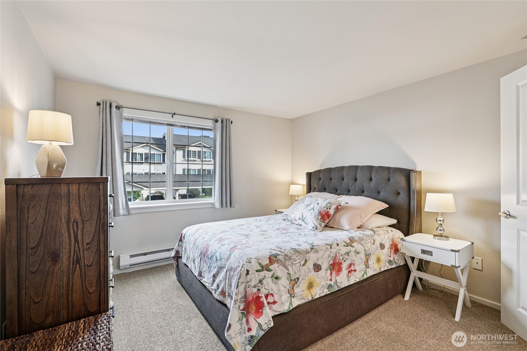 12404 East Gibson Road, Unit N203 Everett, WA 98204 - Photo 12 of 28 a bedroom with a bed and window