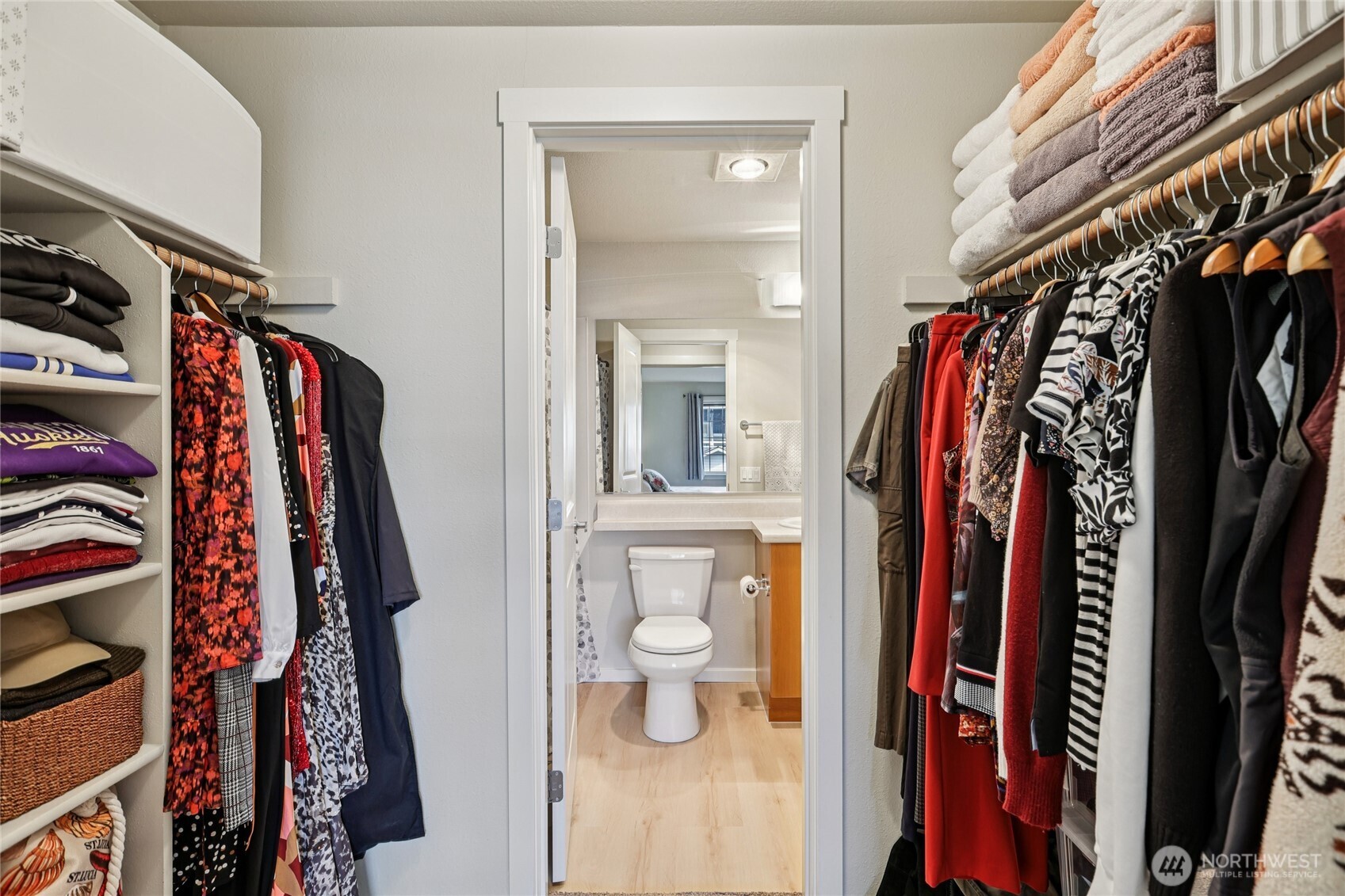 12404 East Gibson Road, Unit N203 Everett, WA 98204 - Photo 14 of 28 a view of walk in closet with clothes and shoes