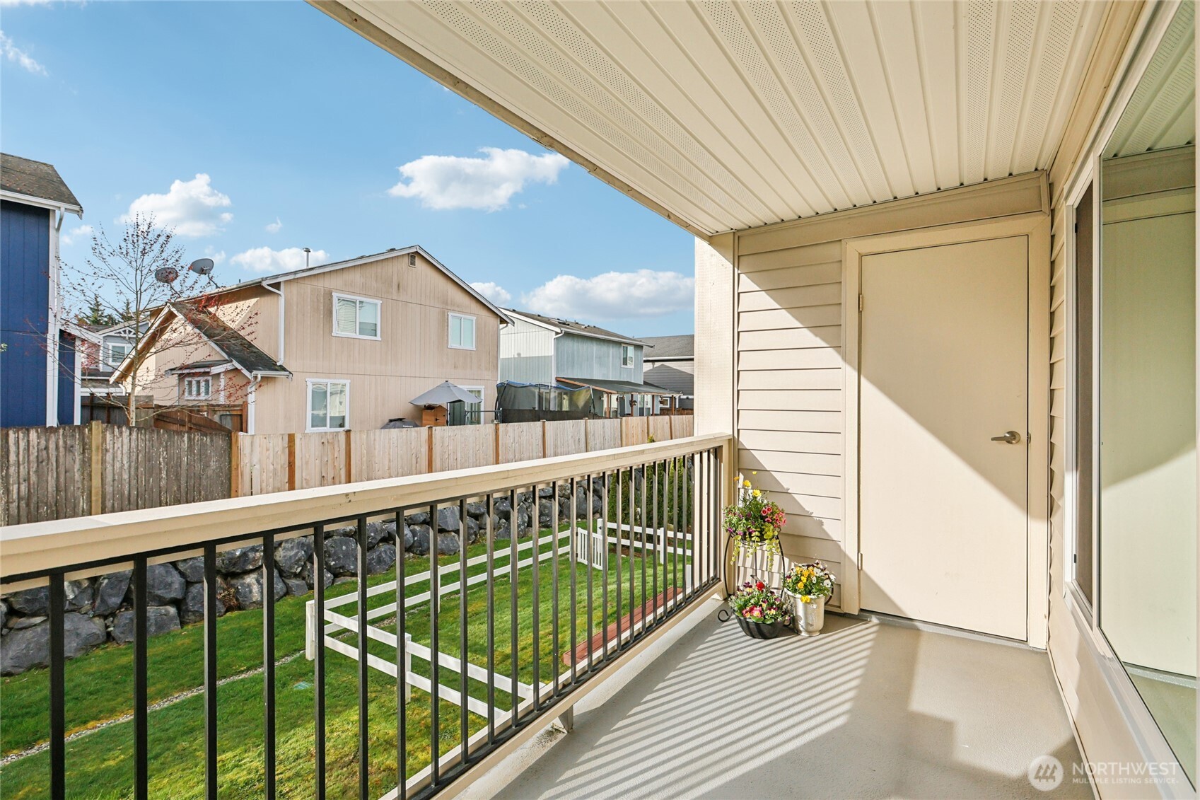 12404 East Gibson Road, Unit N203 Everett, WA 98204 - Photo 17 of 28 a view of balcony with wooden floor