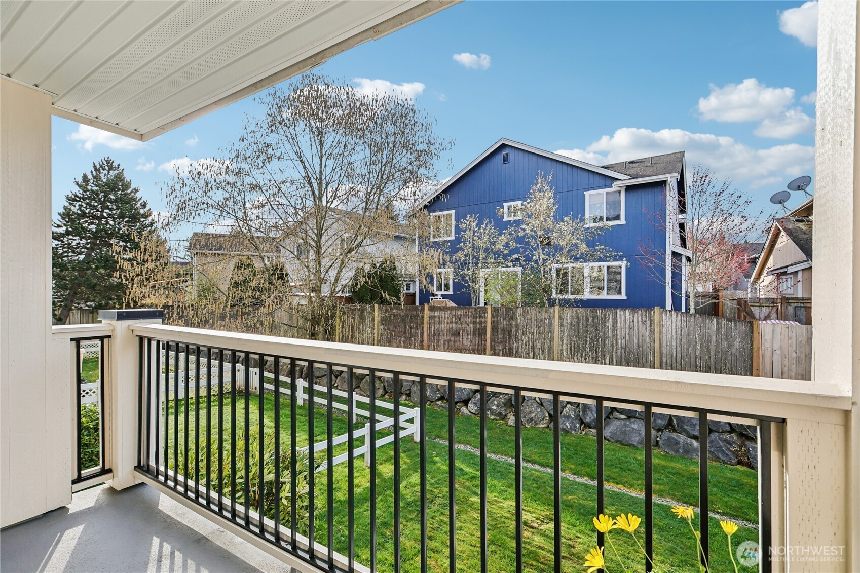 12404 East Gibson Road, Unit N203 Everett, WA 98204 - Photo 18 of 28 a view of a houses from a balcony