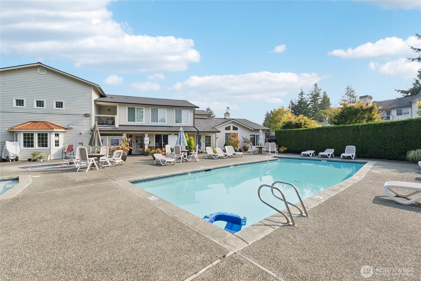 12404 East Gibson Road, Unit N203 Everett, WA 98204 - Photo 22 of 28 a view of a house with pool yard and a lake view