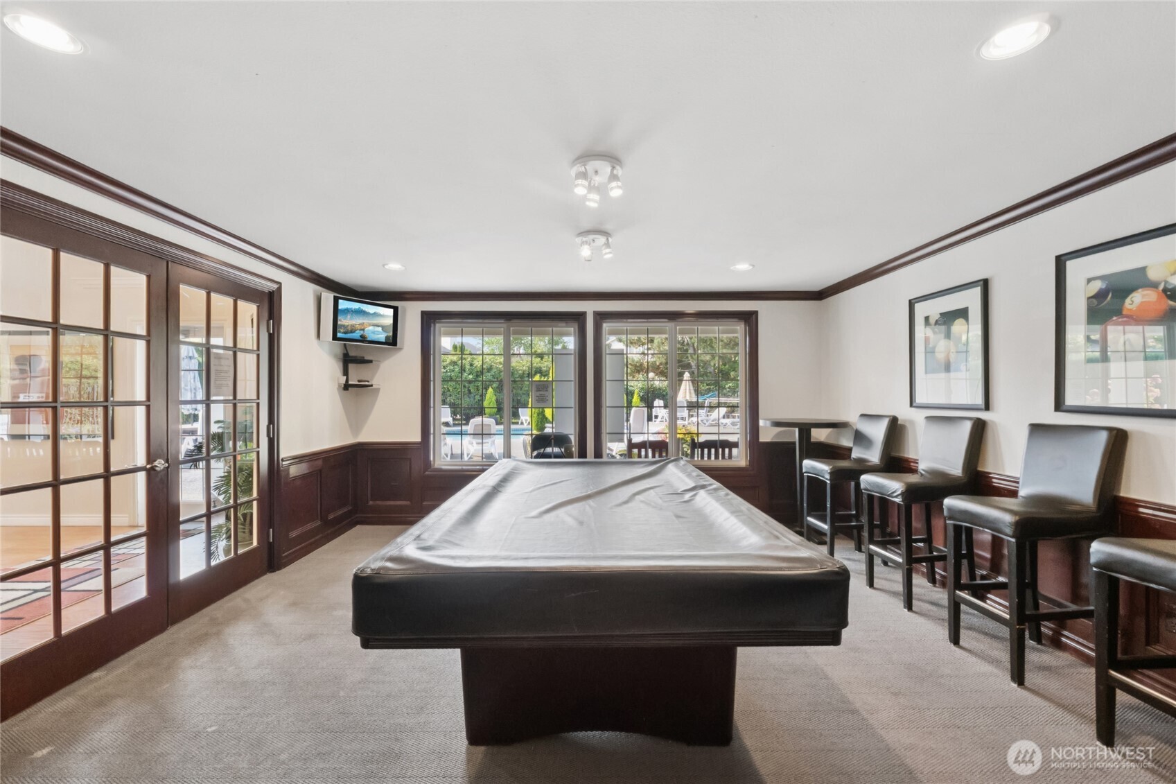 12404 East Gibson Road, Unit N203 Everett, WA 98204 - Photo 25 of 28 a living room with furniture and large windows