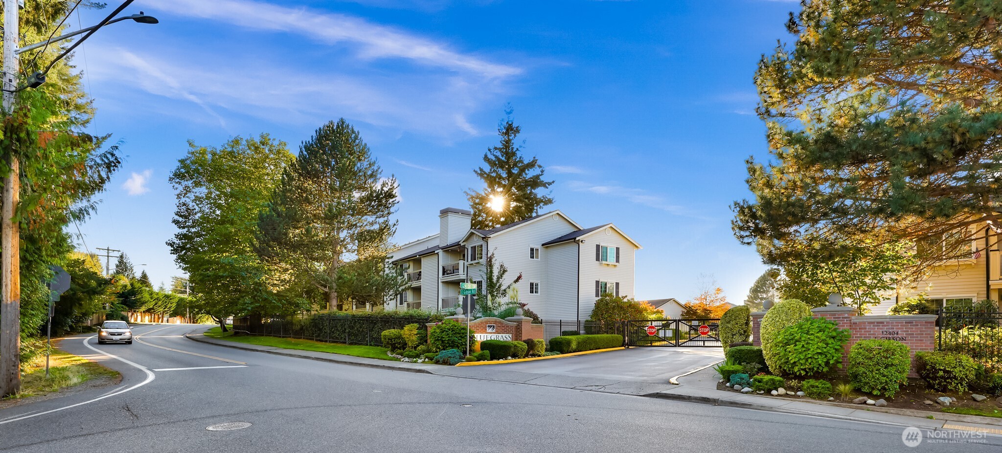 12404 East Gibson Road, Unit N203 Everett, WA 98204 - Photo 26 of 28 a front view of a house with garden