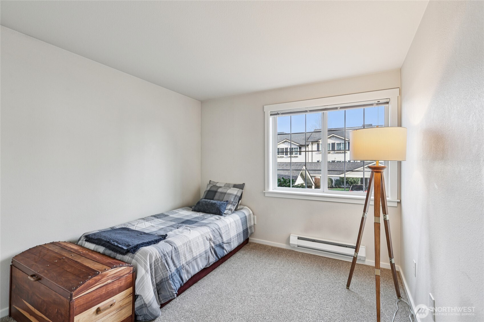 12404 East Gibson Road, Unit N203 Everett, WA 98204 - Photo 9 of 28 a bedroom with a bed and a window