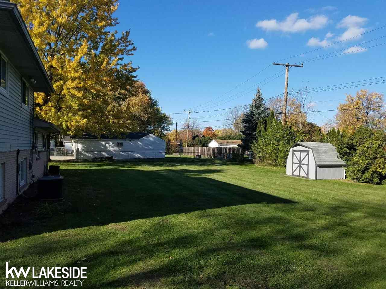 8787 Clinton River Road Sterling Heights, MI 48314 - Photo 17 of 20 Great Fenced Yard