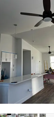 a room with a table and chairs