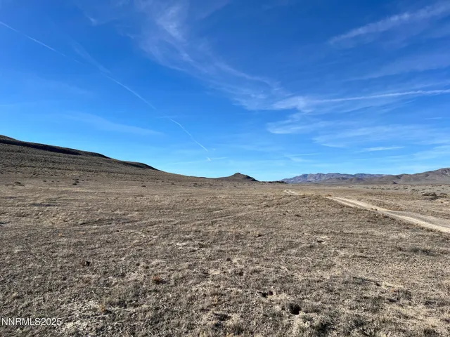 a view of mountain with wooden floor