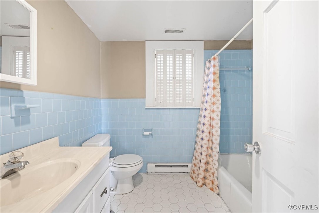 35161 Owens Grove Road Waverly, VA 23890 - Photo 12 of 35 Full bathroom with a baseboard radiator, tile patt