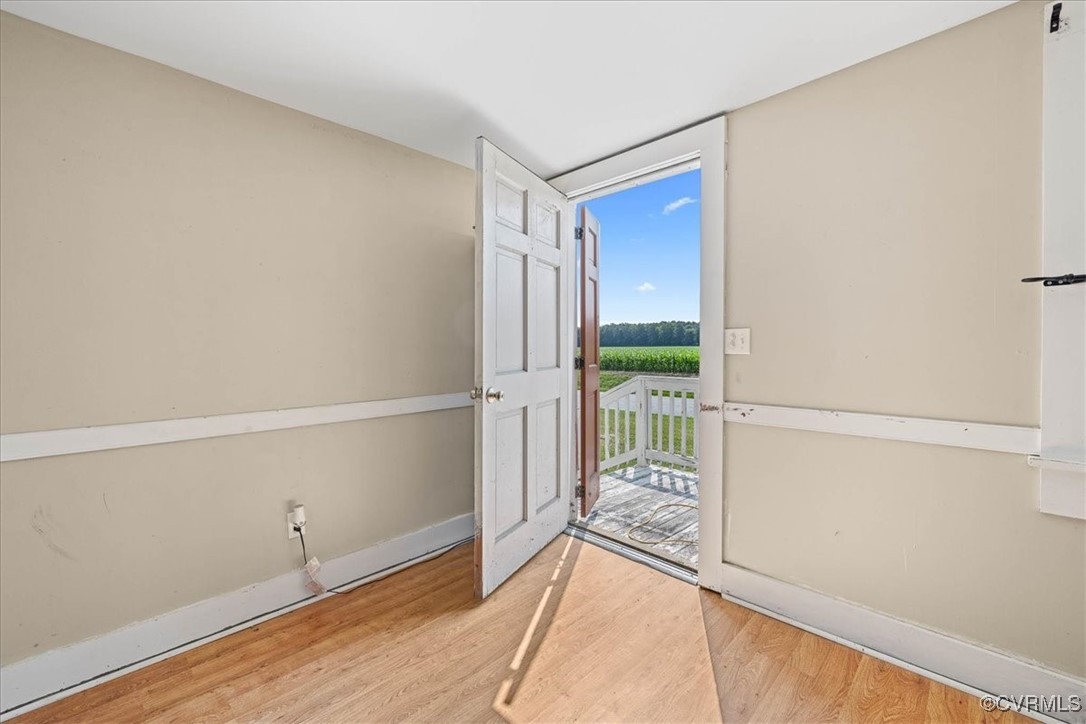 35161 Owens Grove Road Waverly, VA 23890 - Photo 5 of 35 Foyer entrance with wood finished floors and baseb
