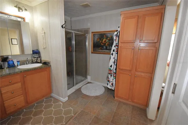 a view of balcony with wooden floor and outdoor seating