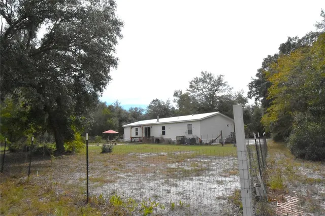 a view of a forest with a sink