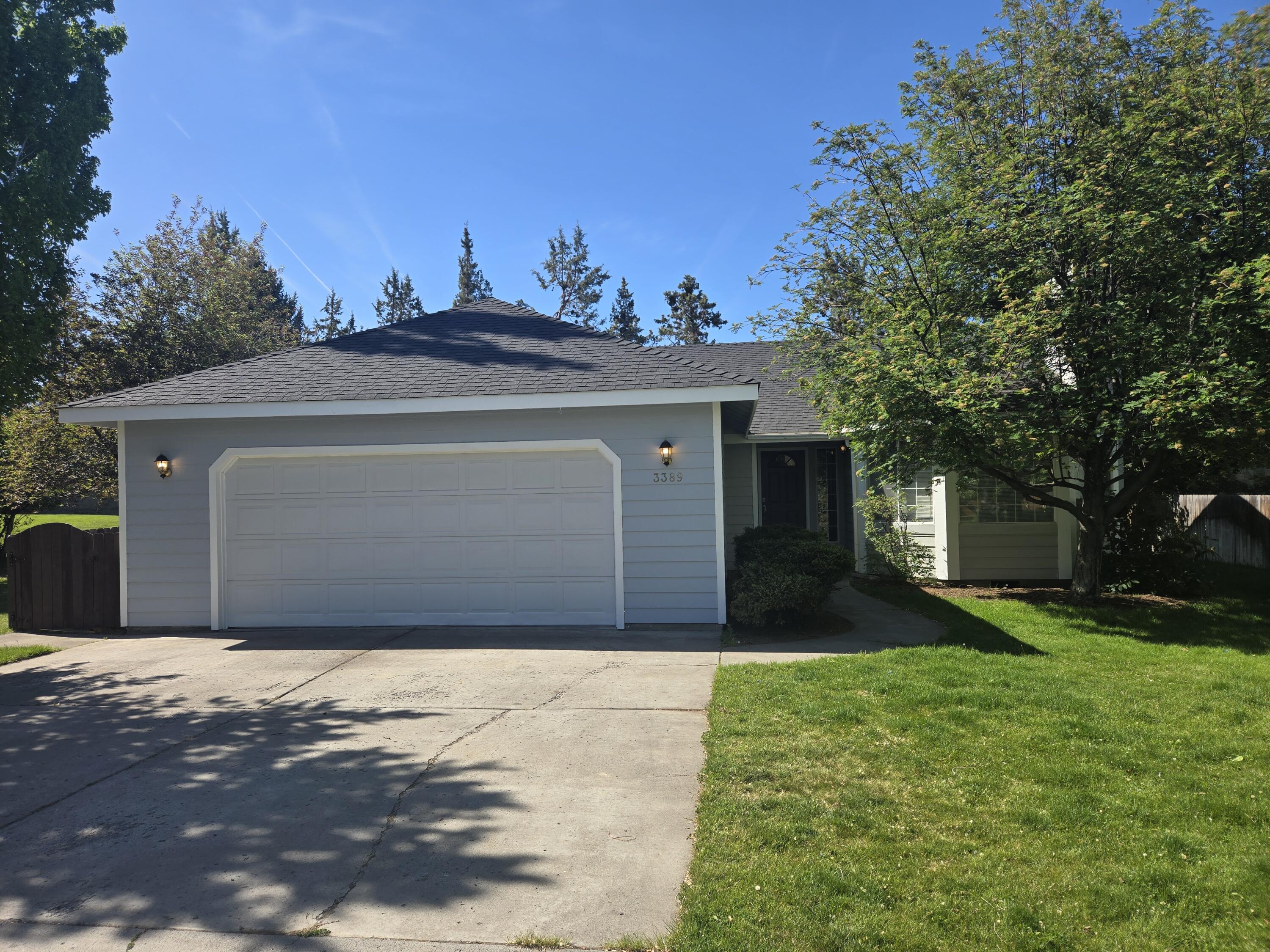 3389 Northeast Stonebrook Loop Bend, OR 97701 - Photo 27 of 27 Concrete driveway into oversized 2-car garage.