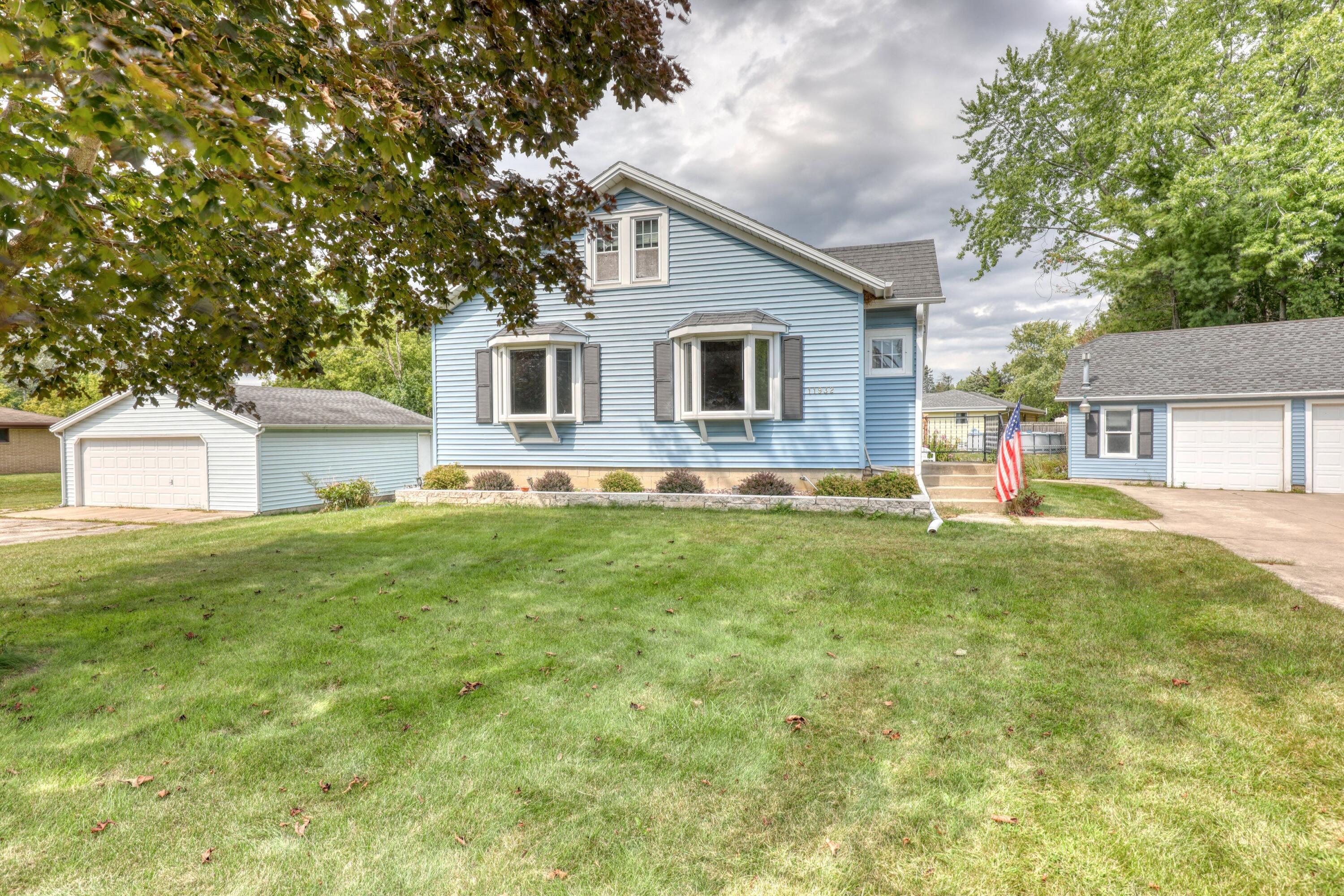 11932 West Woods Road Franklin, WI 53132 - Photo 1 of 1 Front