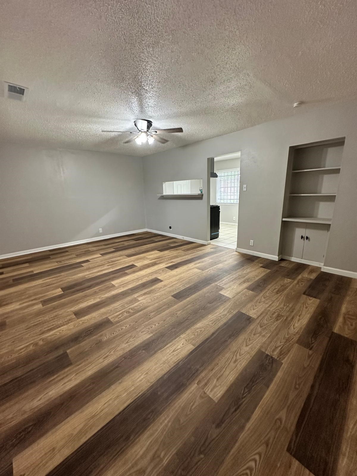 3731 Alberta Street Houston, TX 77021 - Photo 11 of 11 Flowing floor plan connecting the living area to the dining space, ideal for gatherings
