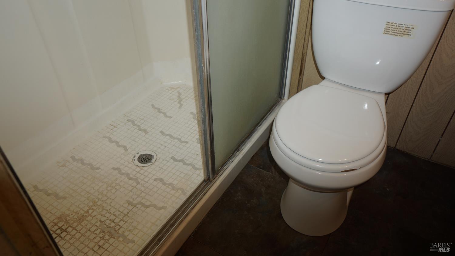 56 Ellie Drive Santa Rosa, CA 95403 - Photo 15 of 17 a bathroom with a toilet and a shower