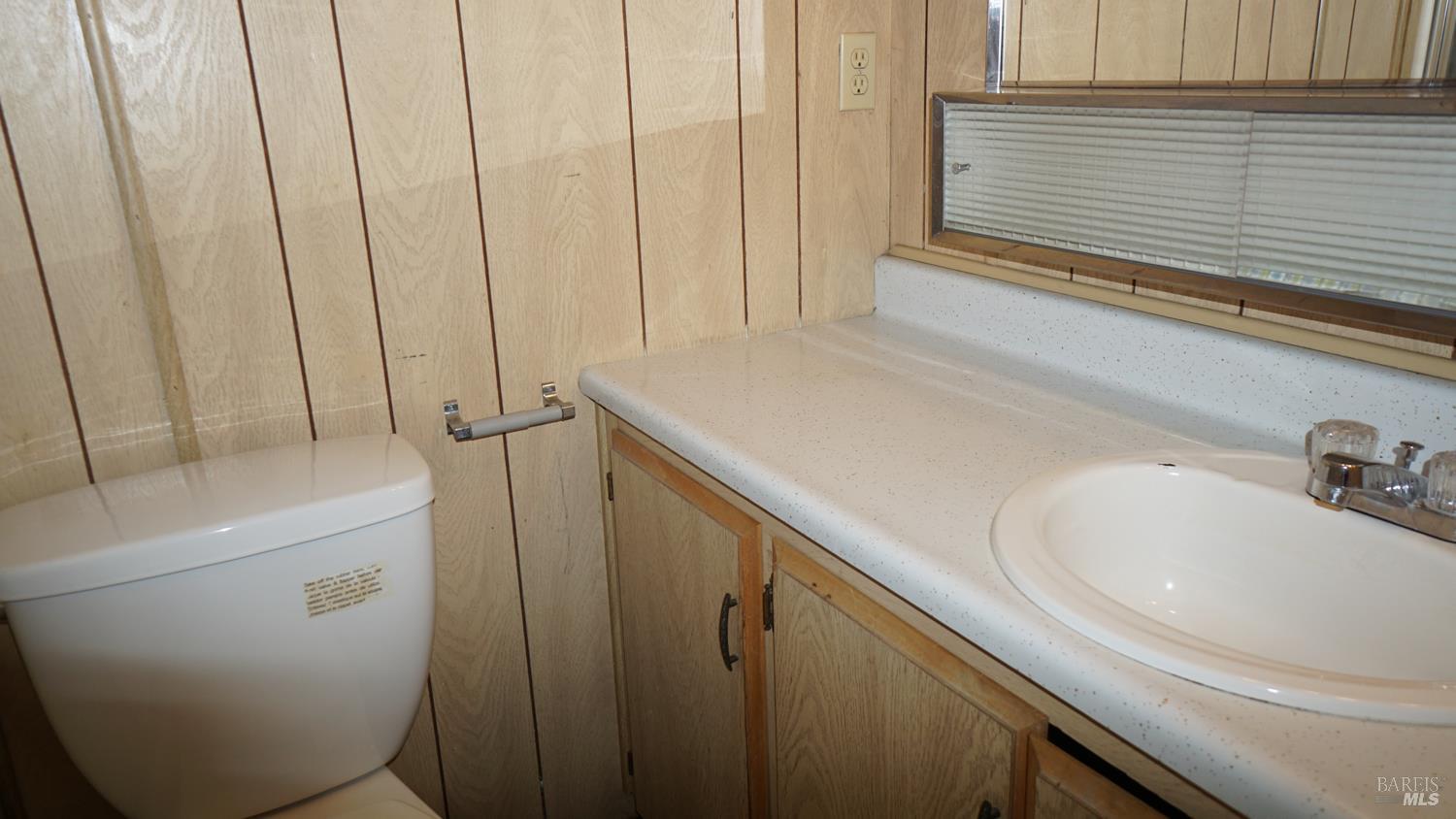 56 Ellie Drive Santa Rosa, CA 95403 - Photo 16 of 17 a bathroom with a sink a toilet and shower