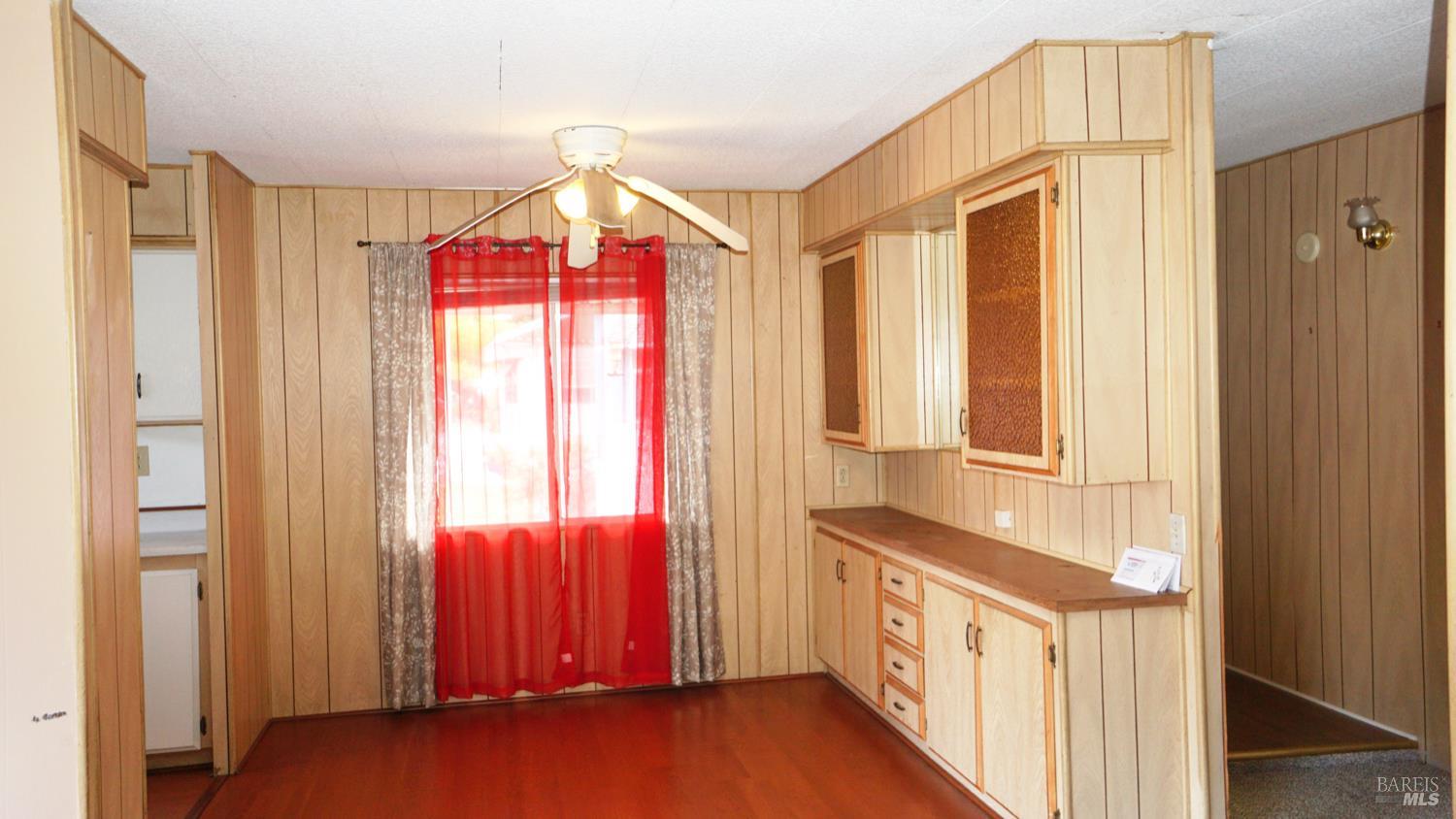 56 Ellie Drive Santa Rosa, CA 95403 - Photo 4 of 17 a view of a kitchen with wooden floor and windows