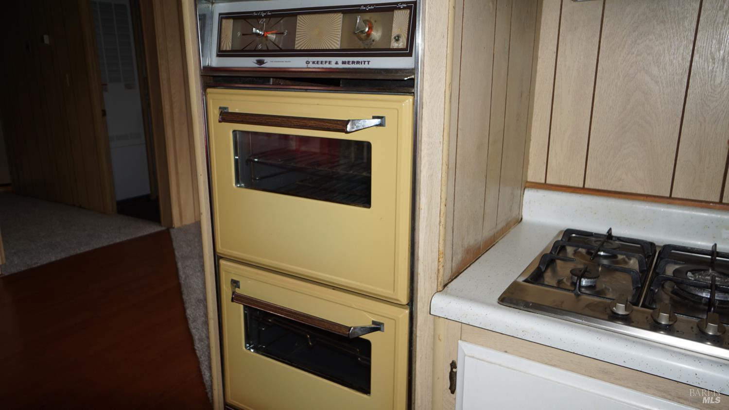 56 Ellie Drive Santa Rosa, CA 95403 - Photo 7 of 17 a close view of a stove and a microwave
