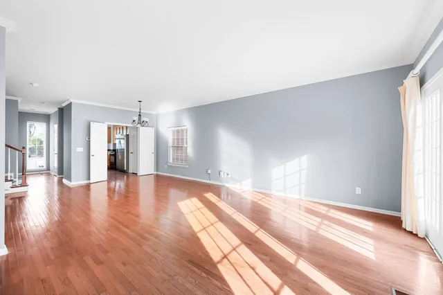 a view of livingroom with hardwood floor and a window