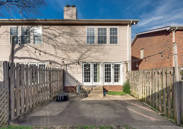 a view of a room with a large window