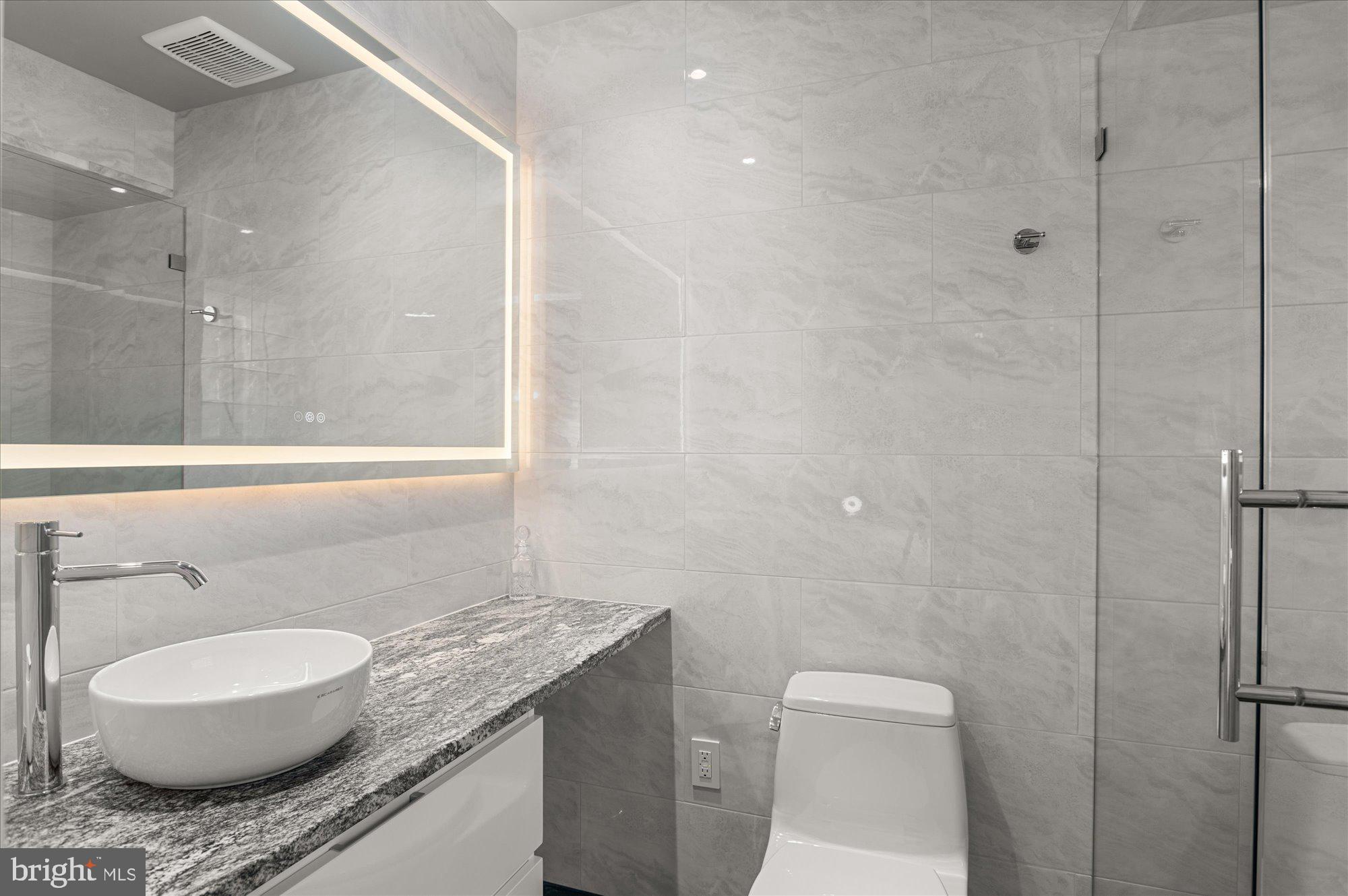 2102 R Street Northwest Washington, DC 20008 - Photo 27 of 54 En suite renovated bath