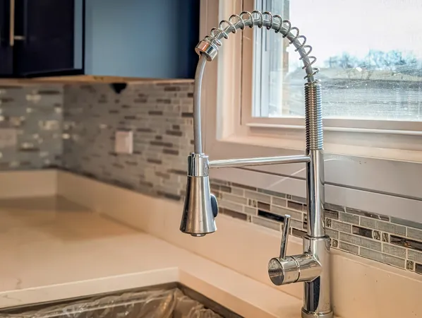 a bathroom with a tub and a sink