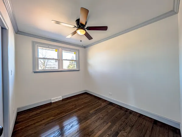 a view of an empty room with stairs