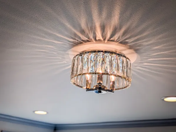a view of staircase with a table and a chandelier