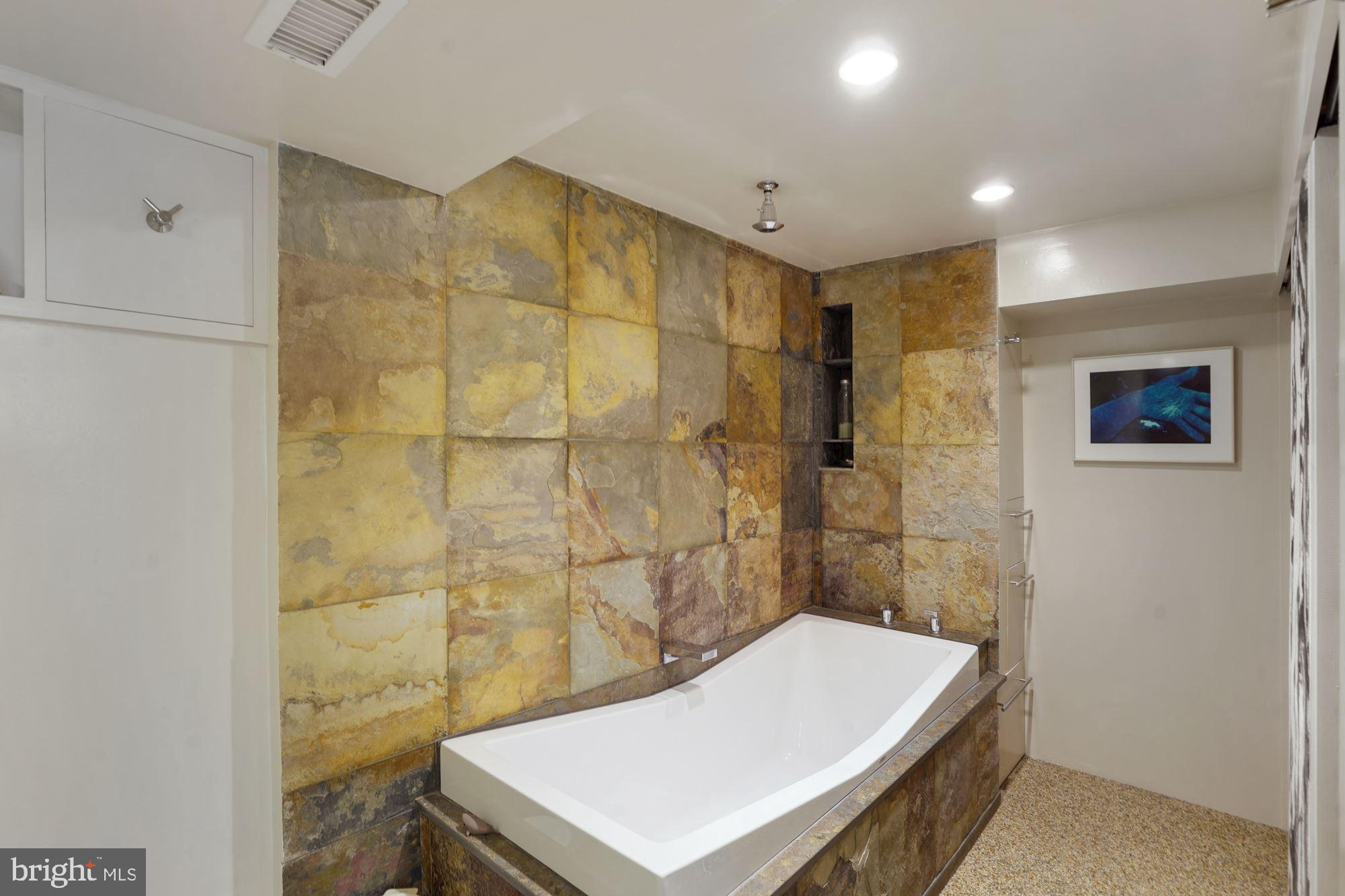 2109 Paul Spring Road Alexandria, VA 22307 - Photo 25 of 74 Hoesch butterfly soaking tub set in slate surround