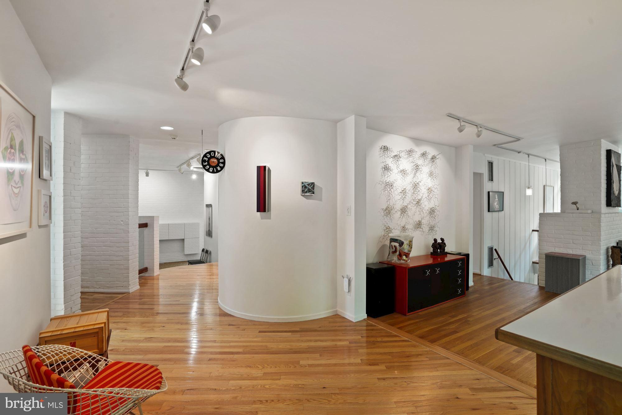2109 Paul Spring Road Alexandria, VA 22307 - Photo 54 of 74 Curving walls leading to studio / office space