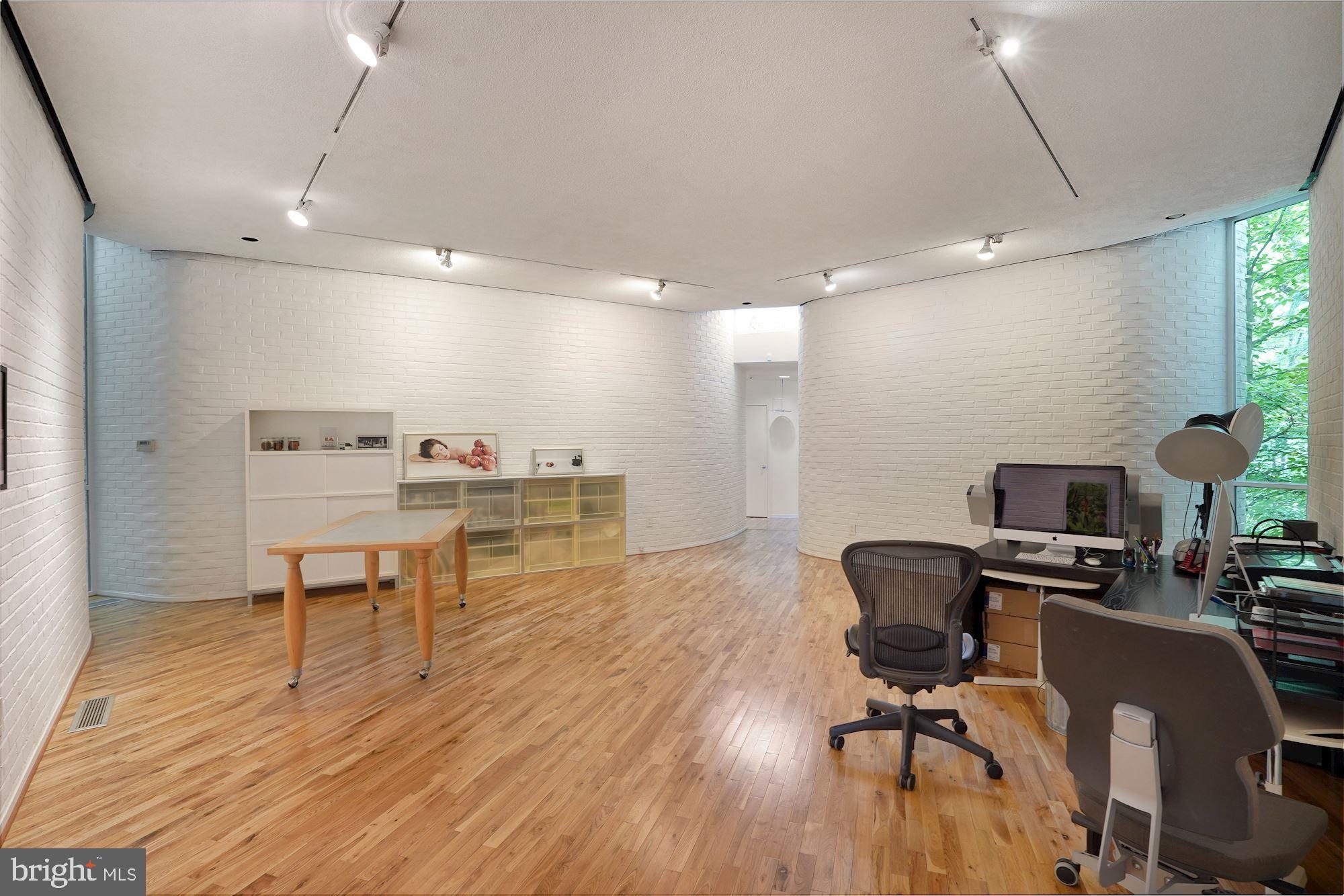 2109 Paul Spring Road Alexandria, VA 22307 - Photo 57 of 74 Floor to ceiling windows set into curved walls