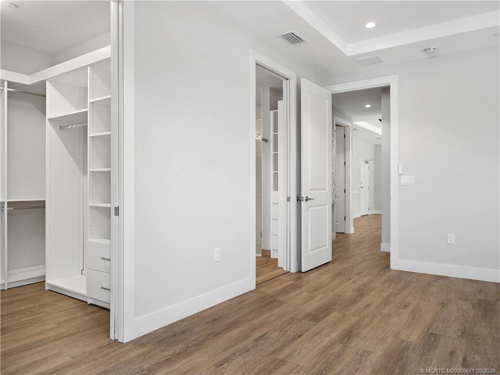 41 Southwest Seminole Street, Unit 208 Stuart, FL 34994 - Photo 26 of 46 a view of entryway with wooden floor
