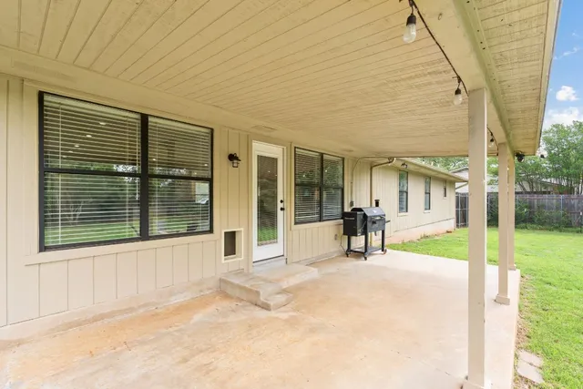 a view of a house with sitting area and porch