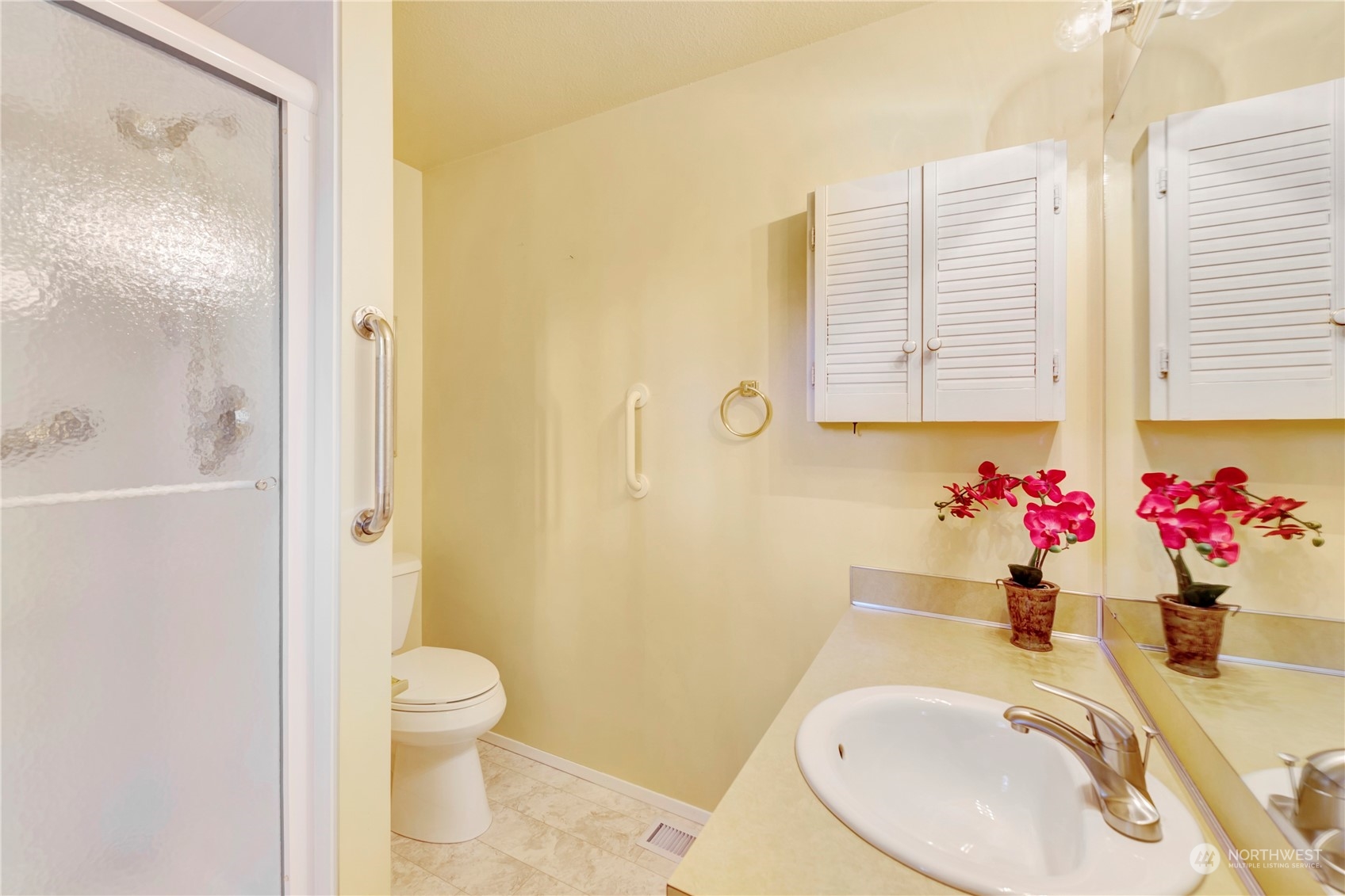 22215 49th Avenue Southeast Bothell, WA 98021 - Photo 15 of 35 a bathroom with a sink toilet and shower